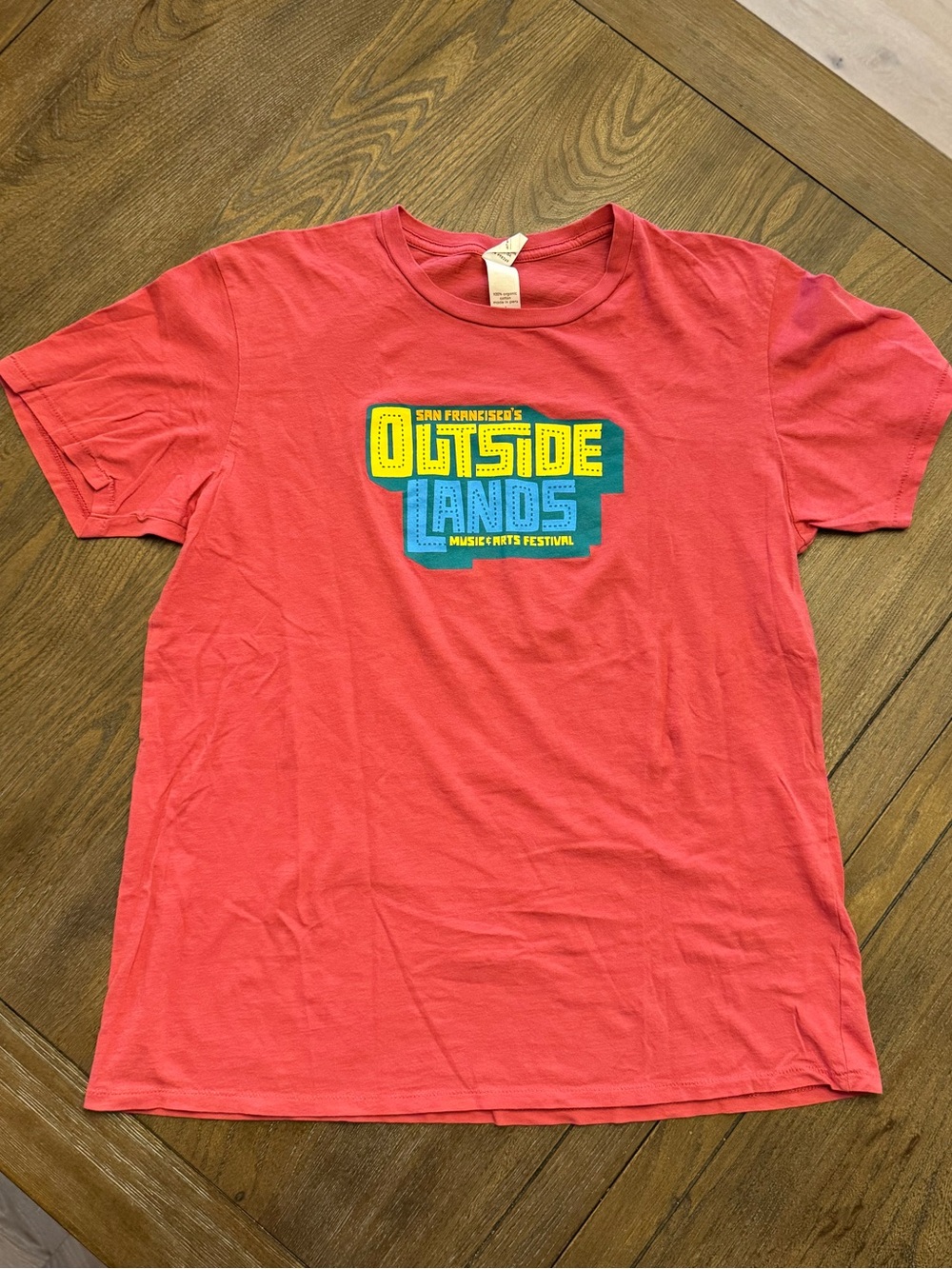 Alternative coral red crewneck tee with green eco logo
